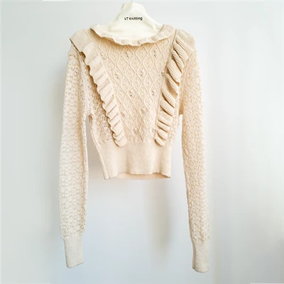 Obrezana pletenina Shrug